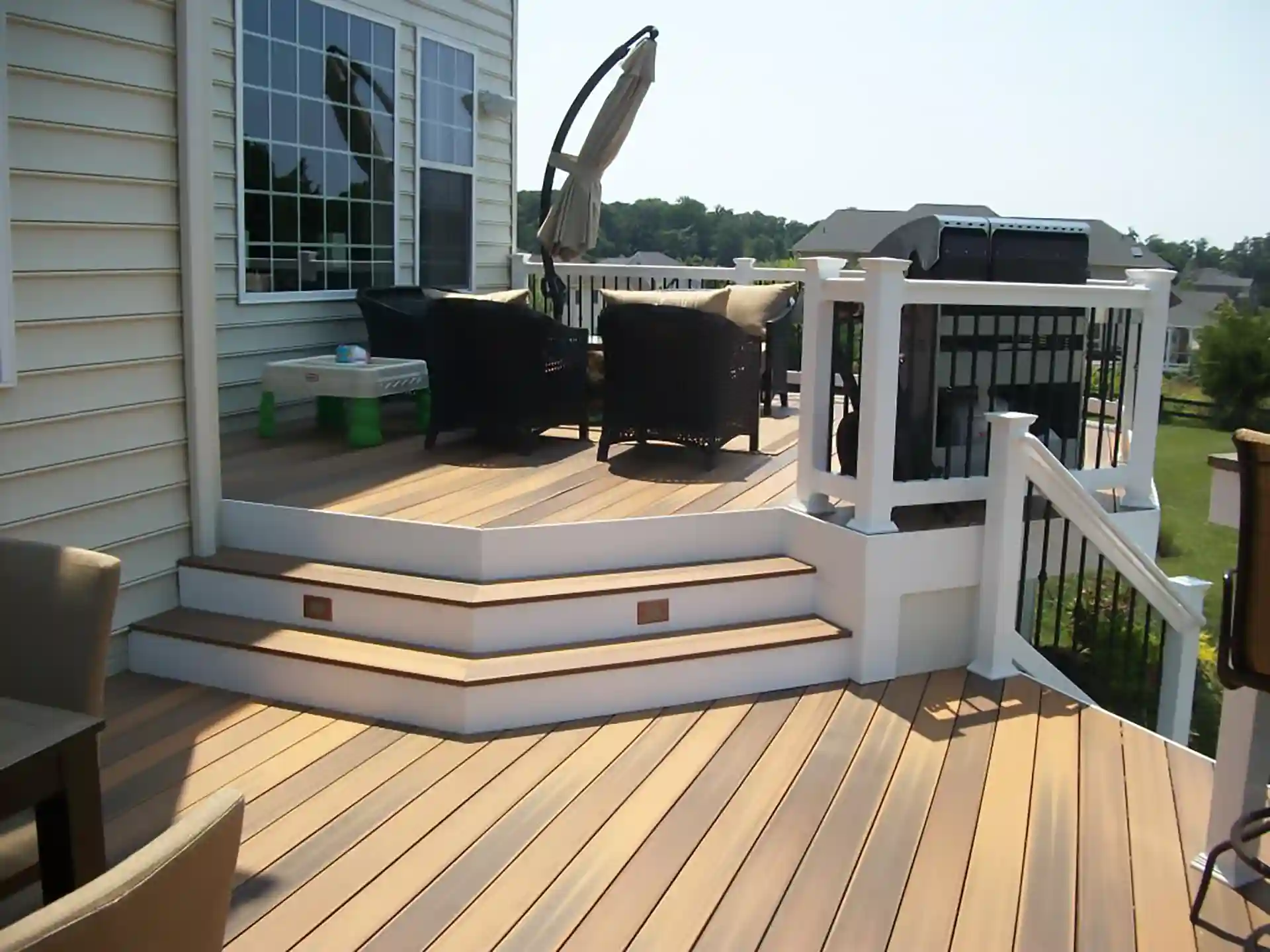 Photo of a duo-tone multi-level deck, which is one of the top deck design trends
