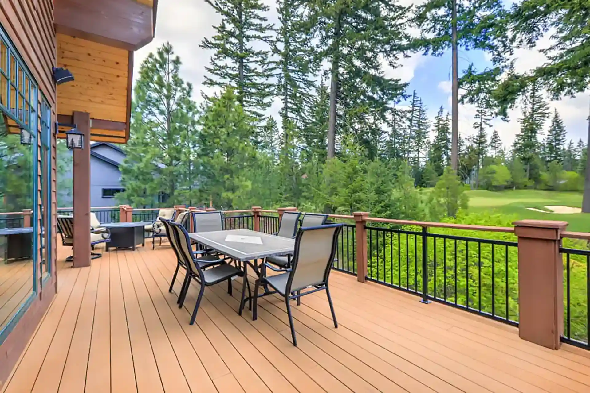 Photo of a deck with outdoor furniture in the summer
