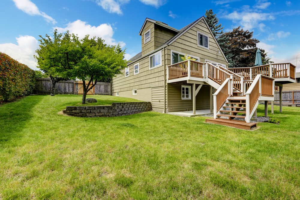 How to Design an Outdoor Living Space for a Sloped Backyard